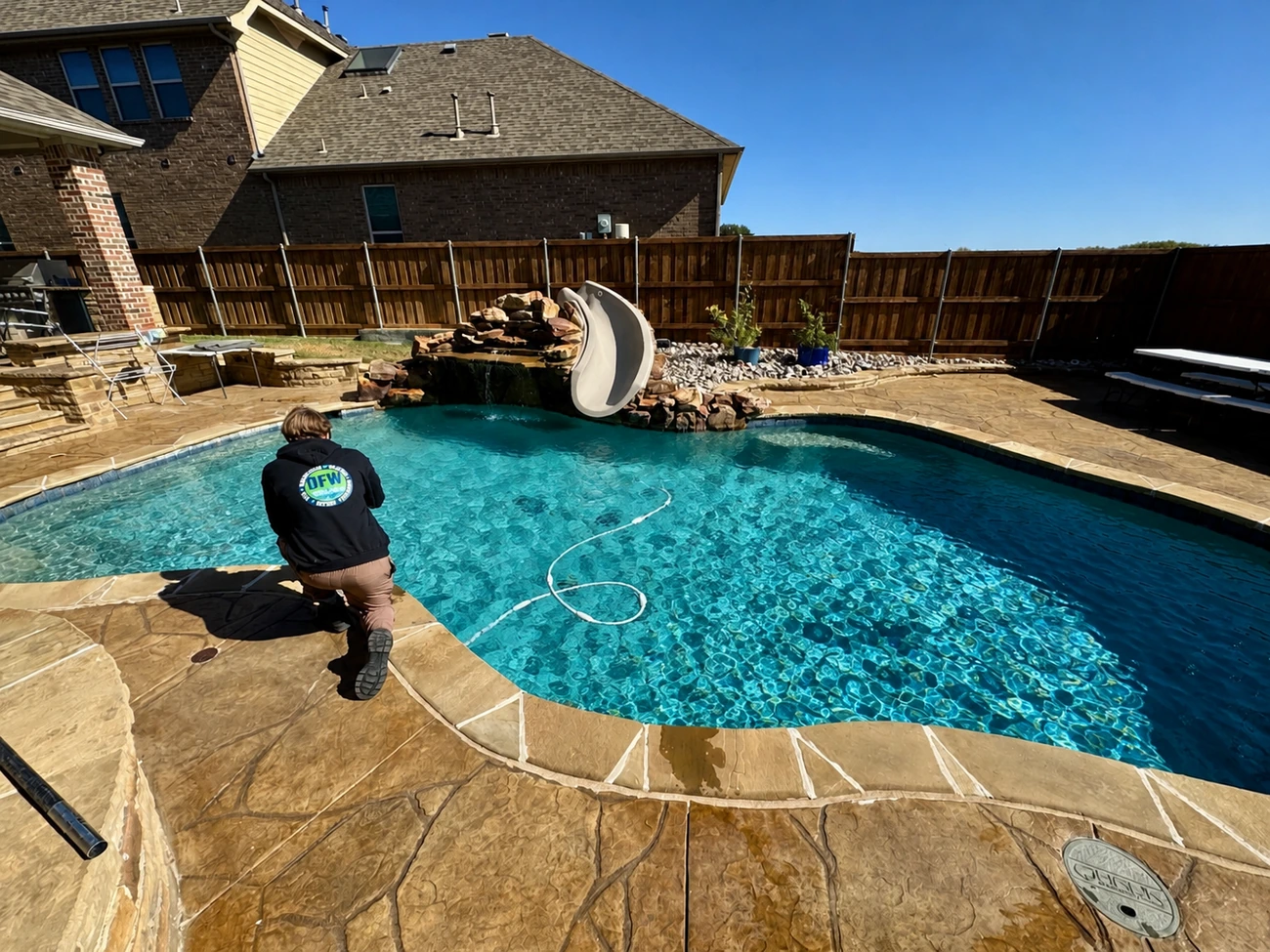 DFW Pools and Spa technician on a service call